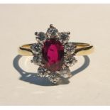 Yellow and white gold, ruby and diamond cluster ri