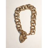 9ct gold double link bracelet with 9ct gold padlock clasp, approx 41g