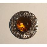 Scottish silver circular brooch set with circular citrine, maker's 'RA', 4.5cm diameter