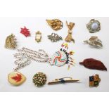 Suitcase and contents of costume jewellery including shell and bead necklaces, a quantity of watch