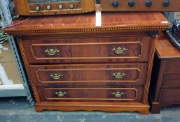 20th century mahogany chest of drawers, the rectangular top above three drawers flanked by