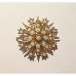 9ct gold and opal star-pattern brooch, eight-point