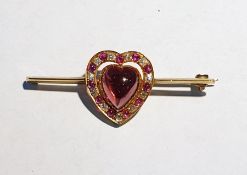 Gold, cabochon garnet, ruby and diamond bar brooch