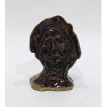 Treacle glazed pottery model of a lady's head, ins