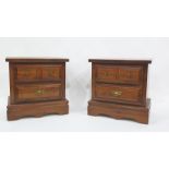 20th century pair of pine bedside chests of two drawers