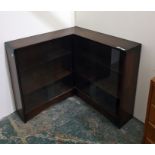 Corner bookshelf unit with sliding glass doors enc