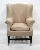 Georgian style shaped-wing square-back armchair with outscroll arms in loose covers and having 'H'