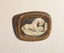 Late Georgian gold-coloured metal and sulphide brooch, circa 1820, rounded oblong with hatched