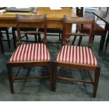 Set of seven Regency style mahogany dining chairs (6 standard plus 1 carver) each with panelled
