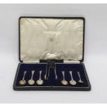 Six various silver teaspoons and a pair matching spoon-end sugar nips plus another sugar nips (8)