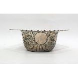 Victorian silver sugar bowl, semi-gadrooned and rococo repousse with engraved tab handles, 18cm