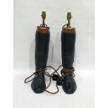Pair of black riding boots with mahogany trees, modelled as table lamps