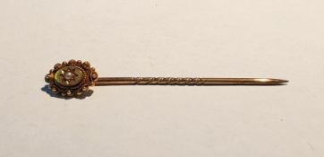 Gold stickpin, the oval terminal set single seedpearl