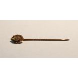 Gold stickpin, the oval terminal set single seedpearl