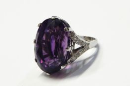 18ct white gold, amethyst and diamond dress ring set one large facet cut amethyst, approx 24.7mm x