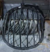 Two iron wall hanging hay racks