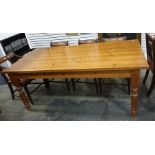 20th century rectangular pine dining table on turned supports