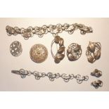 Suite of white metal jewellery of a leaf design comprising necklace, bracelet and earrings, two