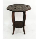 Eastern hardwood octagonal centre table with carved dragon motif to top, 60cm x 72cm