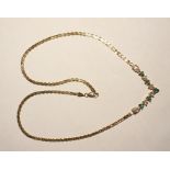 14K gold, emerald and diamond necklace, the chain of flattened serpentine link form and set five