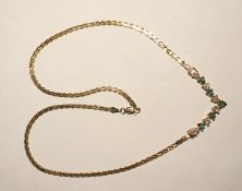 14K gold, emerald and diamond necklace, the chain of flattened serpentine link form and set five