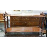 Early Victorian mahogany two-tier whatnot of narrow rectangular form, the turned supports uniting