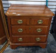 20th century yew bedside chest of drawers, the rectangular top with canted corners, fluted