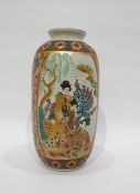 Japanese pottery vase decorated with panels of figures and flowers, of baluster form, 21cm high