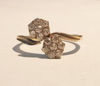 18ct gold and diamond double flowerhead crossover