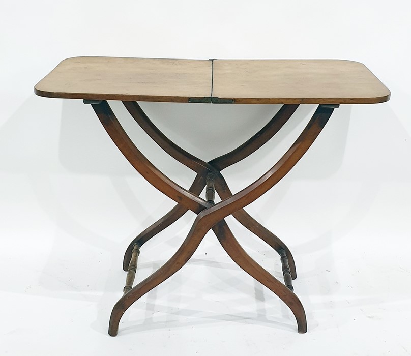 19th century mahogany folding campaign table, the shaped legs united by turned stretchers, 89cm x
