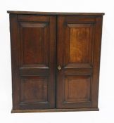 19th century wall-hanging cabinet, the two panelled door opening to reveal shelves, 84.5cm x 93.5cm