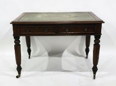 19th century mahogany desk with green leather top above two drawers, faceted supports to brass