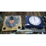 Ion record deck with a long playing record.  A further modern suitcase type record player and two