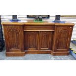 19th century mahogany breakfront sideboard, the moulded edge above central single drawer, above