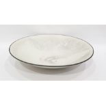 Large pottery bowl of shallow circular form with a white crackle glaze and grey borders, signed to