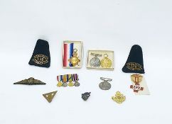 Assorted medals and badges to include examples awa