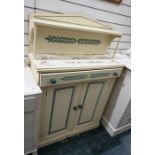 Painted chiffonier, the cream ground tile top above a single drawer and two cupboard doors, to