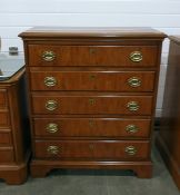 20th century yew chest of five long drawers, raised upon bracket feet, by Drexer