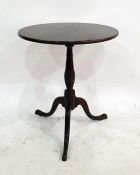 Georgian mahogany centre table with circular top, above turned and ringed column, to three