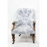 19th century light blue ground foliate upholstered button back salon armchair with turned front legs