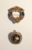 Silver and pietra dura brooch, oval with floral spray decoration, and a Scottish silver, citrine and