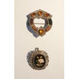 Silver and pietra dura brooch, oval with floral spray decoration, and a Scottish silver, citrine and