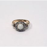 Gold, opal and diamond cluster ring, the central circular opal cabochon surrounded by 13 diamonds,