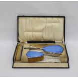 Silver and enamel three-piece dressing table set d