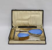 Silver and enamel three-piece dressing table set d