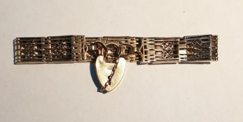 9ct gold fancy gate-link pattern bracelet with heart-shaped padlock clasp, approx 23g