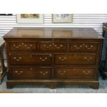 George III style oak and mahogany cross-banded North Country mule chest, the lift top with moulded