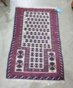 Eastern prayer-type rug, cream ground with repeating pattern motif to a stepped border, in creams,