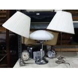 Pair of modern metal table lamps, two other lamps, two Roberts digital radios and two large alarm