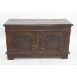 Possibly 17th century oak coffer, the rectangular top with moulded edge, opening to reveal iron